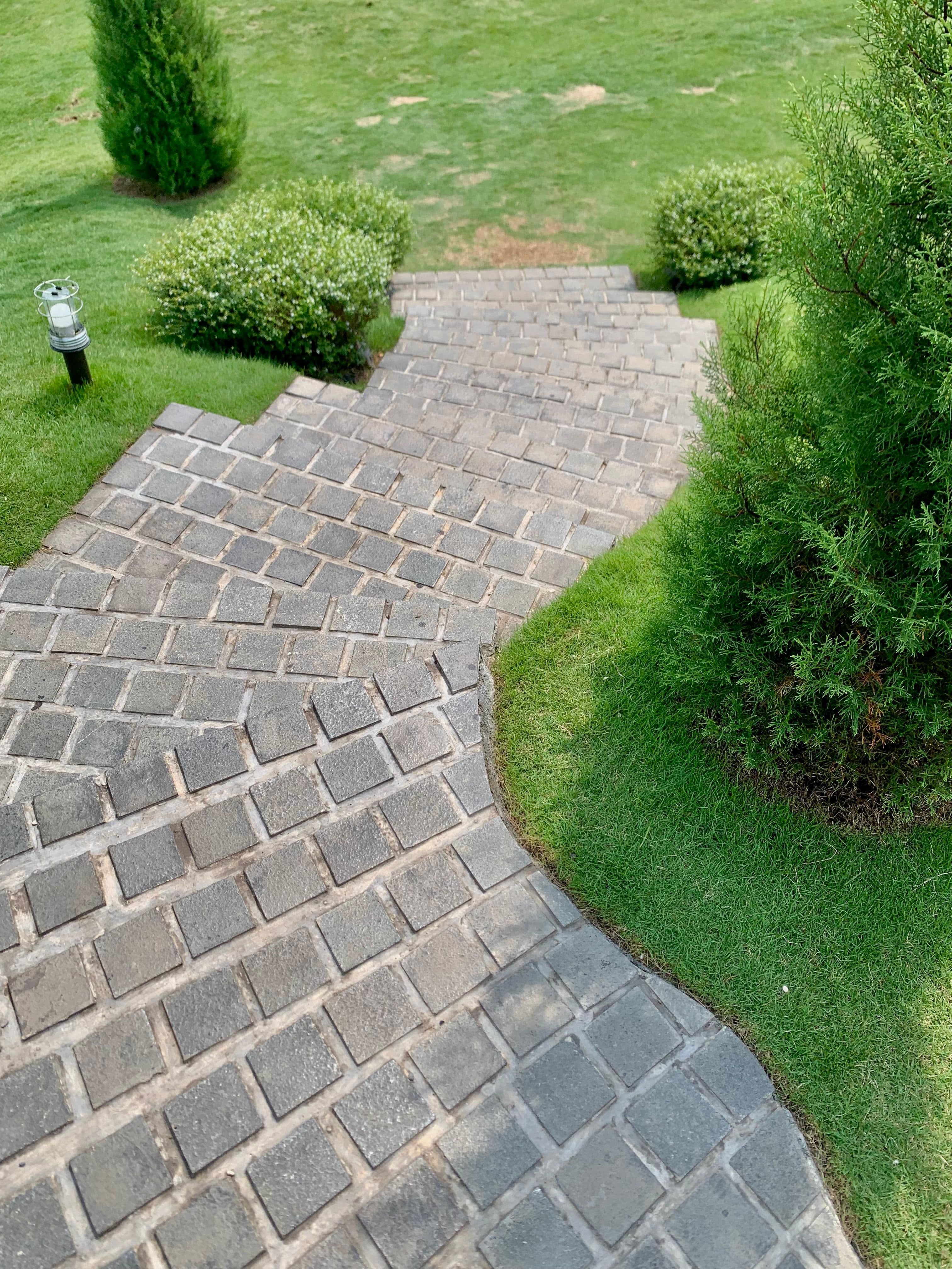 Our stonemasons setting a natural stone patio on a NYC rooftop
